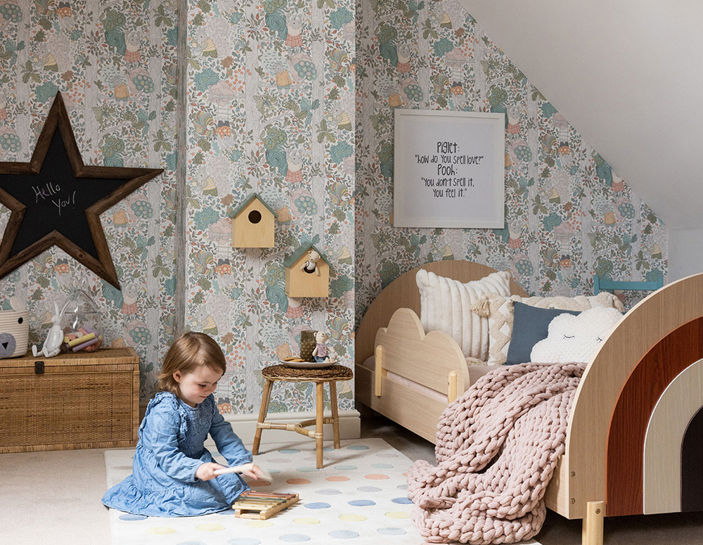 A child playing in a designed room by SW Design Group Ltd.